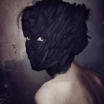 Woman portrait in feathers