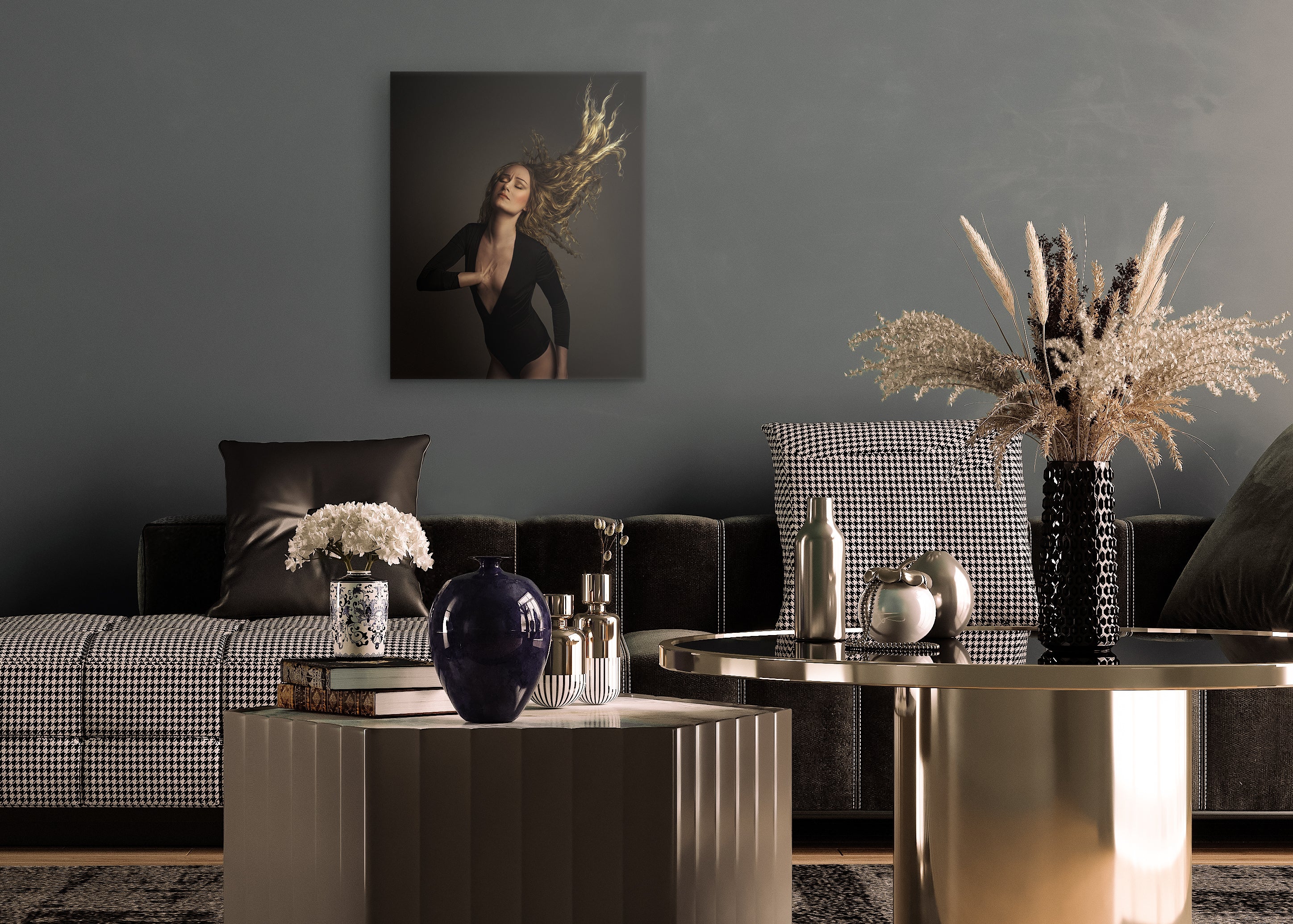 Modern living room with a dark gray wall, decorative items on tables, and a purple abstract painting.